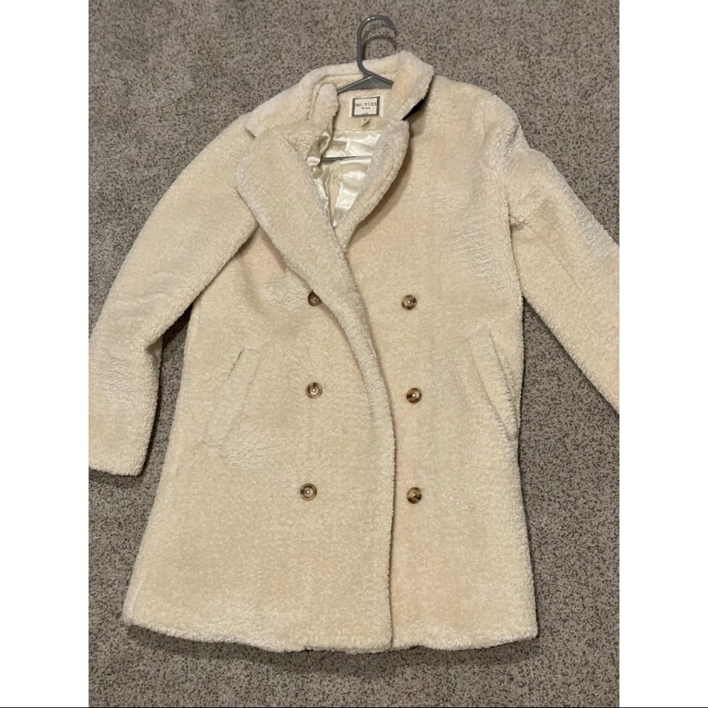 Cream faux fur coat